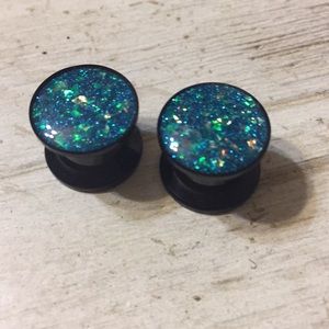 Shiny gauges body jewelry